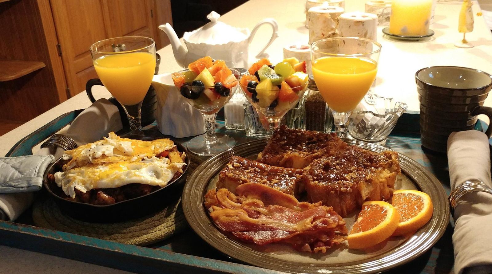 Full breakfast with eggs, bacon and fresh fruit