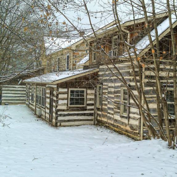 Log cabin exterior in snow